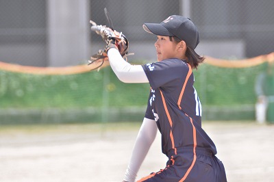 写真：力投するピッチャー