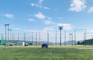 写真：円陣を組む選手たち